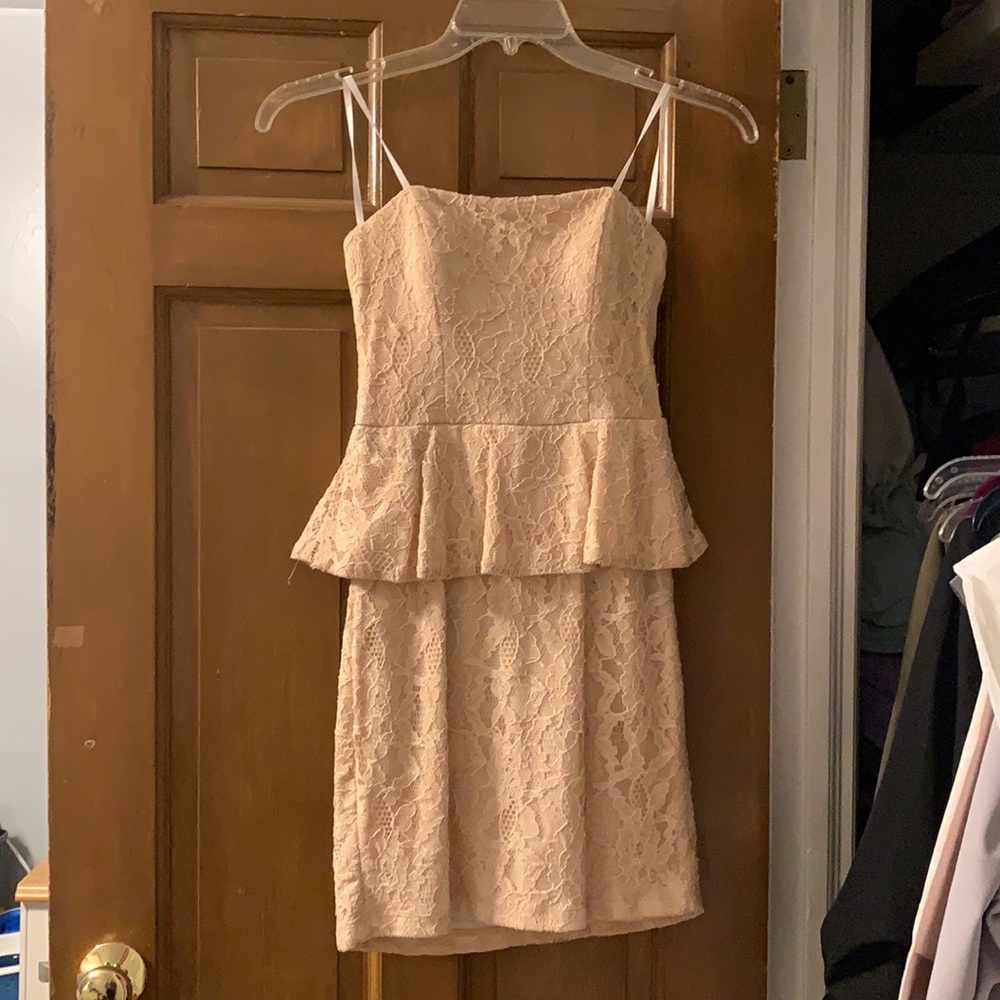 A cream, short, lace dress. Only worn once